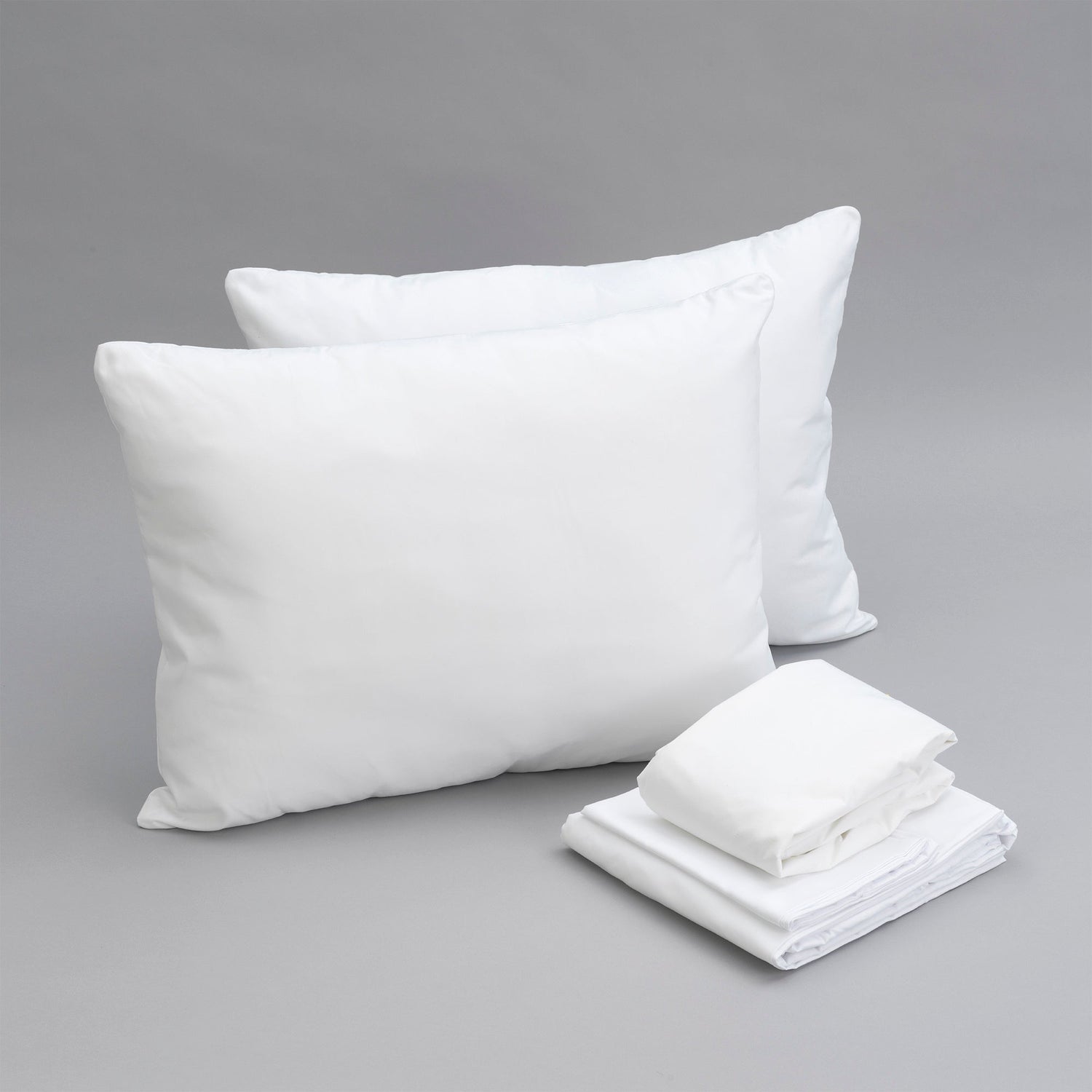 Essentials bedding bundle: pillows, sheet set, mattress protectors