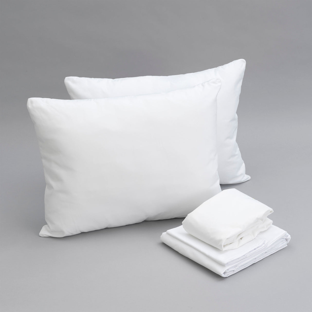 Essentials bedding bundle: pillows, sheet set, mattress protectors